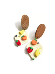 Fruit salad - drops on wood