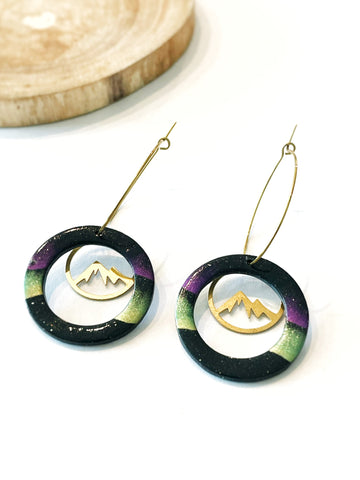 Aurora v12 - cut out circle with mountain brass