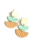 Peach and mint textures with wood
