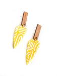 Yellow print - daggers with wood