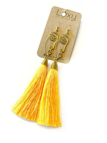 Tassels - yellow on brass faces