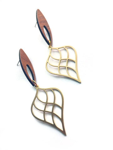 Wood with brass shapey shapes