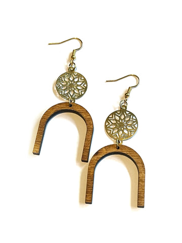 Wood arch with metal design circle