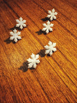 White - snowflake studs - maybe glittered