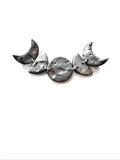 Mooooons - phase pin