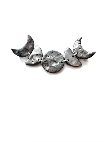 Mooooons - phase pin